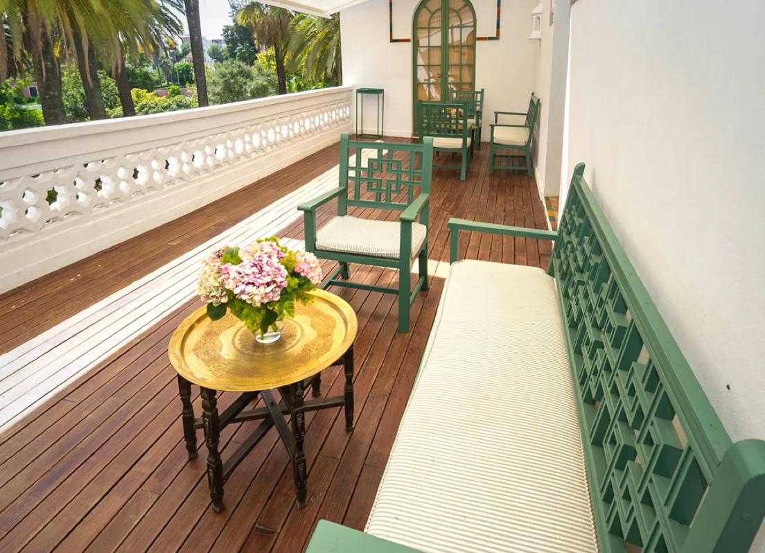 Cozy terrace with wooden furniture