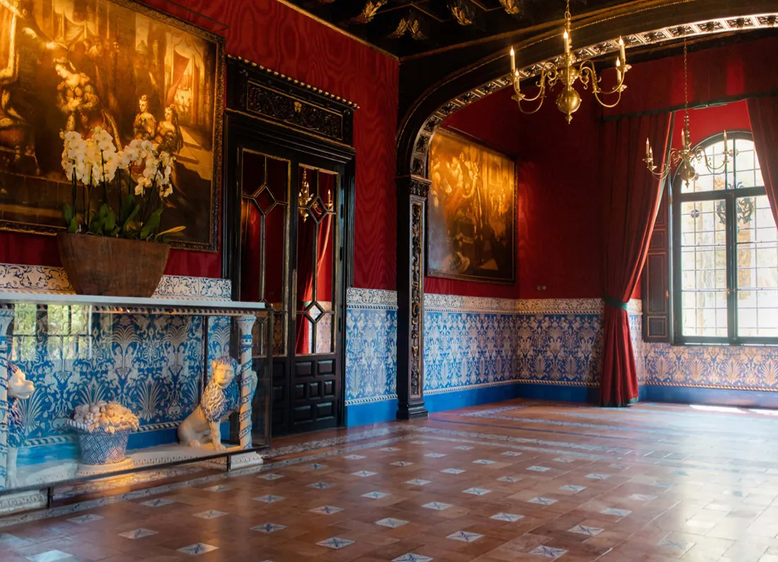 Luxurious hall with paintings and chandelier